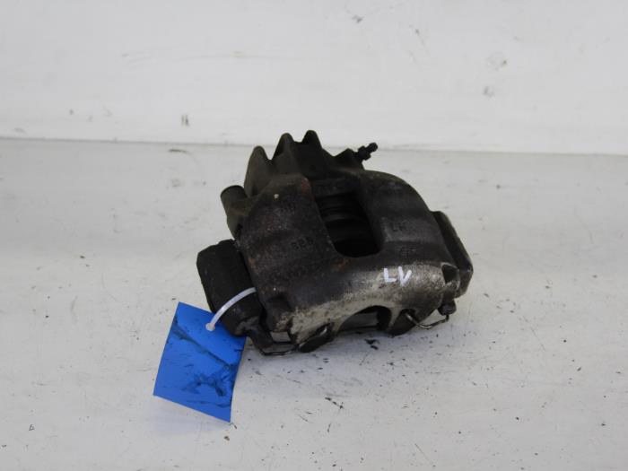 Front brake calliper, left from a Volvo V70 (SW) 2.3 T5 20V 2000