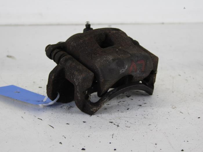 Front brake calliper, left from a Mazda 323 Fastbreak (BJ14) 1.5 LX,GLX 16V 1999