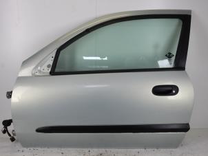 Używane Drzwi lewe wersja 2-drzwiowa Nissan Almera (N16) 1.5 16V Cena € 60,00 Procedura marży oferowane przez Gebr Opdam B.V.