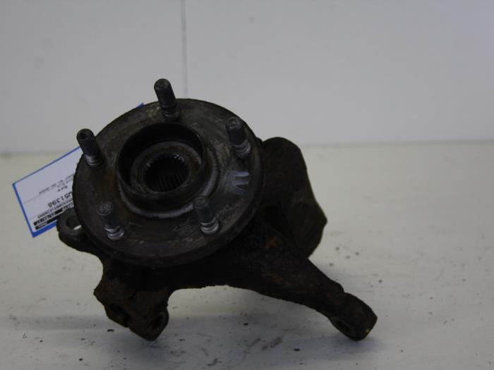 Knuckle, front left from a Ford Mondeo III 2.0 16V 2002