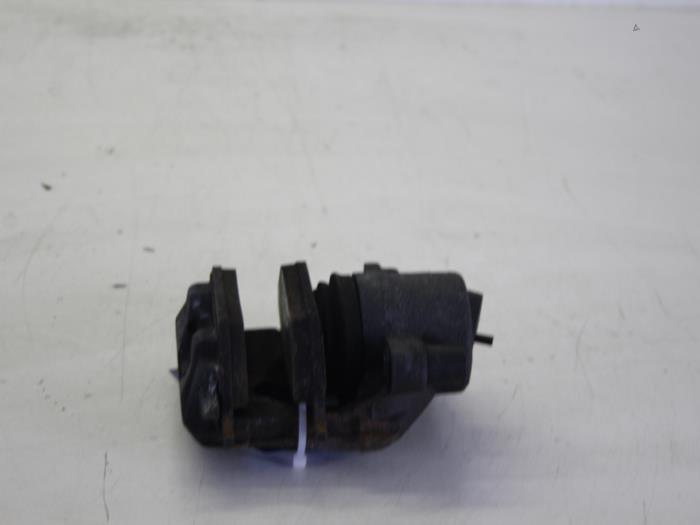 Begagnade Främre bromsok, vänster Volkswagen Polo V (6R) 1.4 TDI DPF BlueMotion technology Pris € 51,00 Marginaltabell erbjuds av Gebr Opdam B.V.