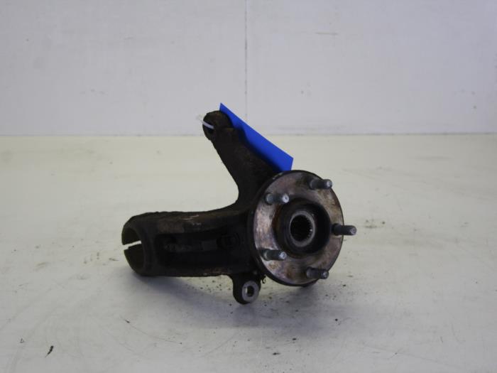 Knuckle, front left from a Ford Mondeo III 2.0 16V 2003