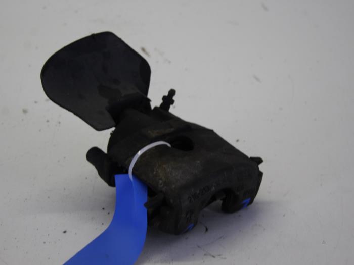 Front brake calliper, left from a Seat Arosa (6H1) 1.0 MPi 2001