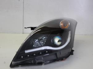 Used Headlight, left Suzuki Swift Price on request offered by Gebr Opdam B.V.