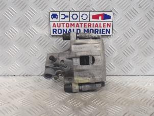 Used Rear brake calliper, left Ford Focus Price € 55,00 Margin scheme offered by Automaterialen Ronald Morien B.V.