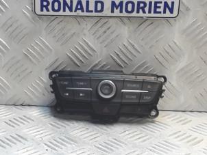 Usagé Panneau commande radio Ford Focus 3 Prix € 33,00 Règlement à la marge proposé par Automaterialen Ronald Morien B.V.