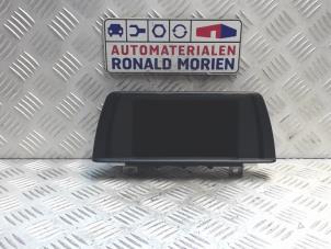 Used Display Multi Media control unit BMW 1 serie (F20) Price € 295,00 Margin scheme offered by Automaterialen Ronald Morien B.V.