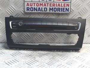 Gebrauchte Radiobedienfeld BMW 1 serie (F20) Preis € 29,00 Margenregelung angeboten von Automaterialen Ronald Morien B.V.