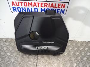 Usagé Couverture moteur BMW X1 (F48) sDrive 20i 2.0 16V Twin Power Turbo Prix € 45,00 Règlement à la marge proposé par Automaterialen Ronald Morien B.V.