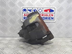 Used Front brake calliper, left Volvo V40 (MV) 1.6 D2 Price € 39,00 Margin scheme offered by Automaterialen Ronald Morien B.V.