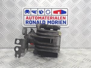 Używane Zacisk hamulcowy lewy tyl Volkswagen Caddy III (2KA,2KH,2CA,2CH) 1.6 TDI 16V Cena € 49,00 Procedura marży oferowane przez Automaterialen Ronald Morien B.V.