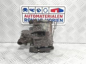 Used Rear brake calliper, left Ford Focus 2 2.0 16V Price € 25,00 Margin scheme offered by Automaterialen Ronald Morien B.V.