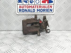 Used Front brake calliper, left Volvo V40 (VW) 1.8 16V Price € 35,00 Margin scheme offered by Automaterialen Ronald Morien B.V.