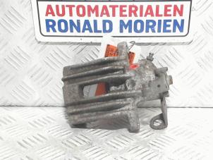 Używane Zacisk hamulcowy lewy tyl Volkswagen Polo V (6R) 1.2 TSI Cena € 29,00 Procedura marży oferowane przez Automaterialen Ronald Morien B.V.