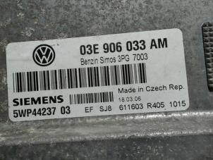 Engine management computer from a Seat Ibiza III (6L1) 1.2 12V 2006