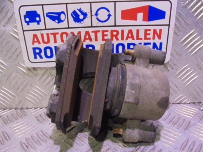 Front brake calliper, right from a Volkswagen Polo VI (AW1) 1.0 TSI 12V BlueMotion 2019