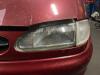 Headlight, left from a Ford Galaxy (WGR) 2.8i V6 1999