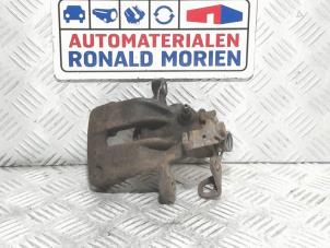 Used Rear brake calliper, left Ford Galaxy (WGR) 2.8i V6 Price € 35,00 Margin scheme offered by Automaterialen Ronald Morien B.V.