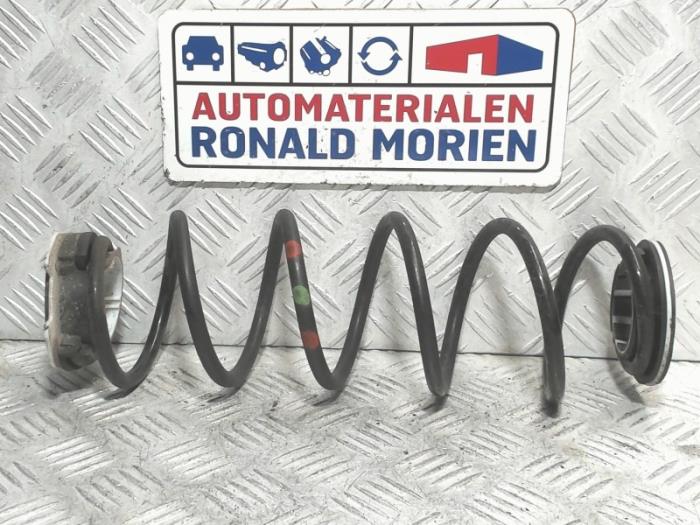 Rear coil spring from a Opel Corsa F (UB/UH/UP) 1.2 12V 75 2021