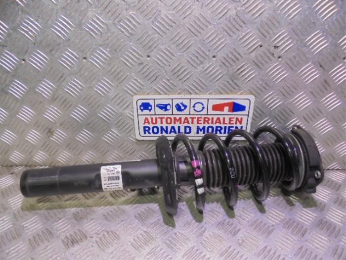 Front shock absorber rod, left from a Volkswagen Jetta IV (162/16A) 2.0 TDI 16V 2016