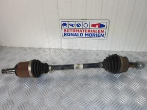 Used Front drive shaft, left Opel Corsa IV 1.2 16V Price € 30,00 Margin scheme offered by Automaterialen Ronald Morien B.V.