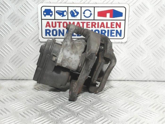 Rear brake calliper, left from a Opel Astra K Sports Tourer 1.4 Turbo 16V 2017
