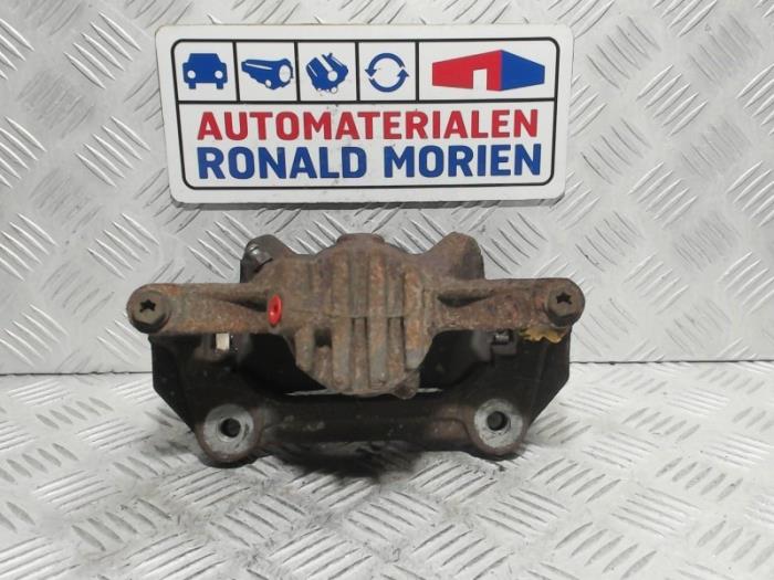 Front brake calliper, left from a Renault Trafic (1FL/2FL/3FL/4FL) 1.6 dCi 125 Twin Turbo 2019