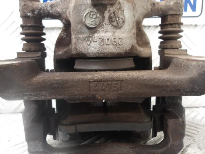 Rear brake calliper, left from a Vauxhall Astra Mk.7 1.4 16V 2016