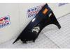 Front wing, left from a Seat Ibiza ST (6J8) 1.2 TDI Ecomotive 2012
