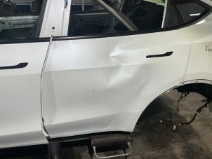 Gebrauchte Tür 4-türig links hinten Tesla Model Y (5YJY) RWD Preis € 400,00 Mit Mehrwertsteuer angeboten von Automaterialen Ronald Morien B.V.