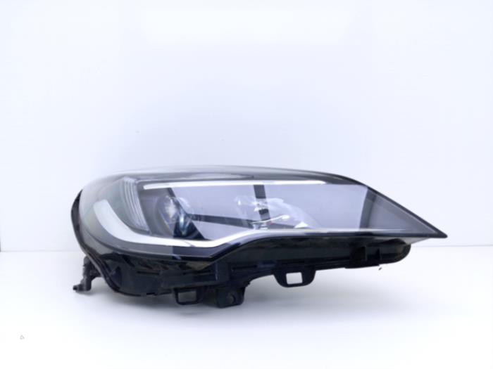 Używane Reflektor prawy Opel Astra K Sports Tourer 1.0 Turbo 12V Cena € 95,00 Procedura marży oferowane przez Automaterialen Ronald Morien B.V.