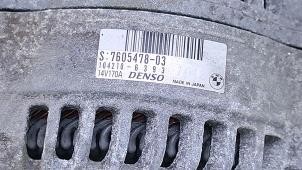 Dynamo van een BMW X1 (E84) sDrive 20i 2.0 16V Twin Power Turbo 2014