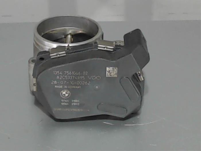 Throttle body from a BMW 3 serie (E46/2C) 318 Ci 16V 2005