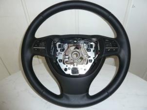 Used Steering wheel BMW 5 serie (F10) 520d 16V Price € 150,00 Margin scheme offered by Automaterialen Ronald Morien B.V.