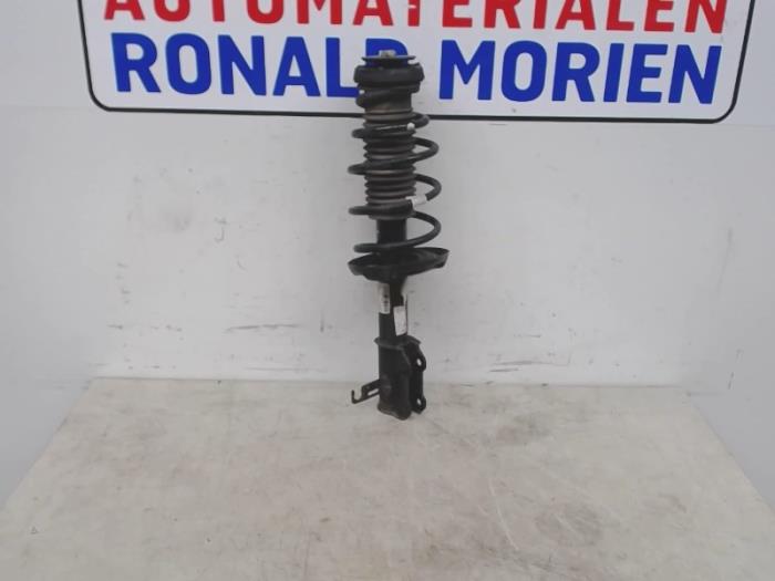 Front shock absorber rod, left from a Opel Astra J (PC6/PD6/PE6/PF6) 1.4 16V ecoFLEX 2013