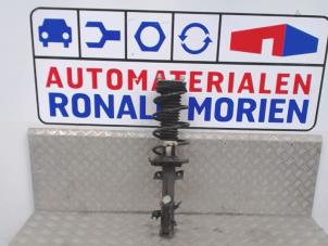 Gebrauchte Stoßdämpferstrebe links vorne Ford Fiesta Preis € 75,00 Margenregelung angeboten von Automaterialen Ronald Morien B.V.