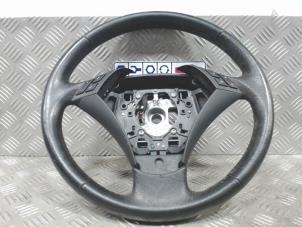 Used Steering wheel BMW 5 serie (E60) 525d 24V Price € 150,00 Margin scheme offered by Automaterialen Ronald Morien B.V.