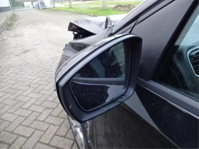 Wing mirror, left from a Volkswagen Polo V (6R) 1.2 TDI 12V BlueMotion 2010