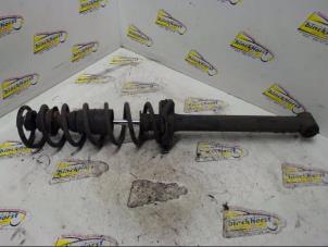 Used Rear shock absorber rod, right Mazda Demio (DW) 1.3 16V Price € 42,00 Margin scheme offered by Binckhorst BV
