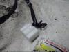 Främre bältesspänne, vänster från en Mazda 6 SportBreak (GH19/GHA9) 2.0i 16V S-VT 2009