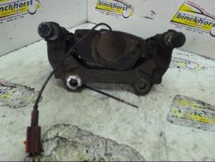 Used Front brake calliperholder, left Fiat Stilo (192A/B) 1.2 16V 3-Drs. Price € 21,00 Margin scheme offered by Binckhorst BV