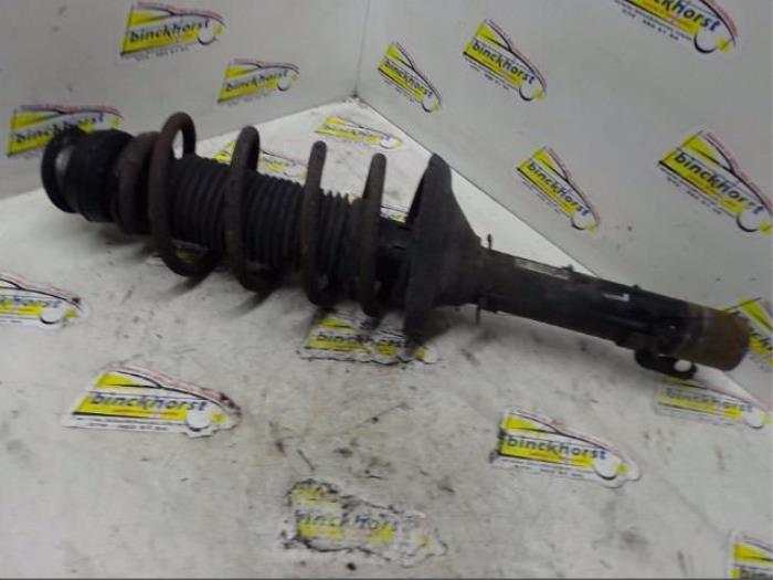 Front shock absorber rod, left from a Volkswagen New Beetle (9C1/9G1) 2.0 1999