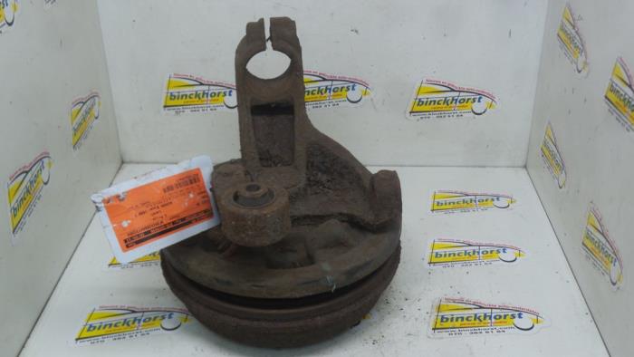 Knuckle, rear right from a Ford Mondeo II 1.8 TD CLX 1999