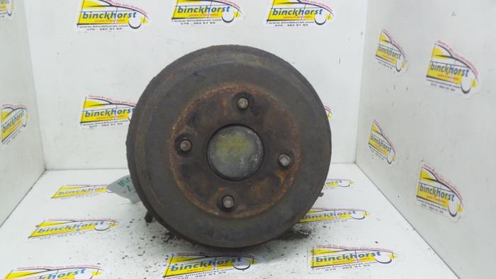 Knuckle, rear right from a Ford Mondeo II 1.8 TD CLX 1999