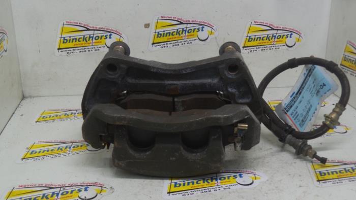 Front brake calliper, right from a Nissan Murano 2006