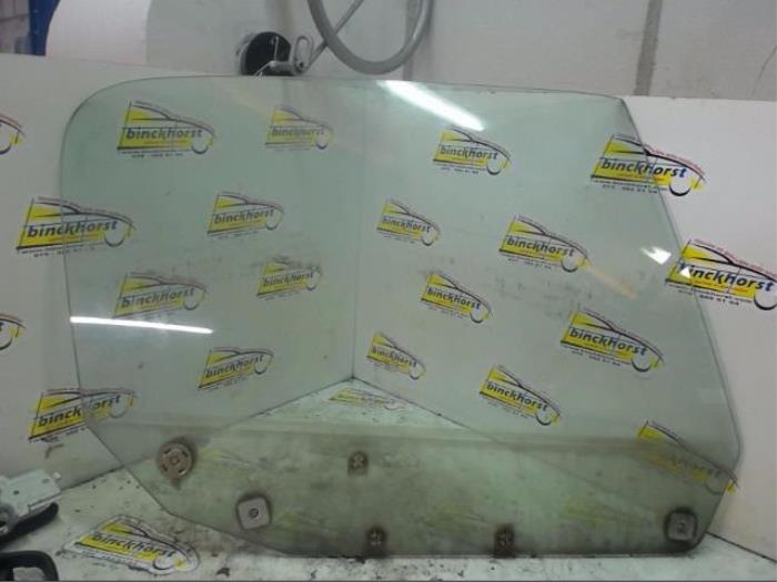Usados Ventanilla de puerta de 2 puertas derecha Mazda MX-5 (NB18/35/8C) 1.6i 16V Precio € 42,00 Norma de margen ofrecido por Binckhorst BV