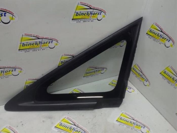Usados Ventanilla triangular izquierda delante Mazda Premacy 1.8 16V Precio € 36,75 Norma de margen ofrecido por Binckhorst BV