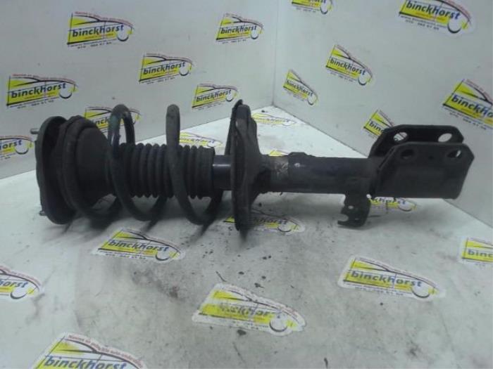 Front shock absorber rod, left from a Toyota Corolla Verso (R10/11) 2.0 D-4D 16V 2004