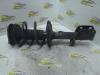 Front shock absorber rod, left from a Toyota Corolla Verso (R10/11) 2.0 D-4D 16V 2004