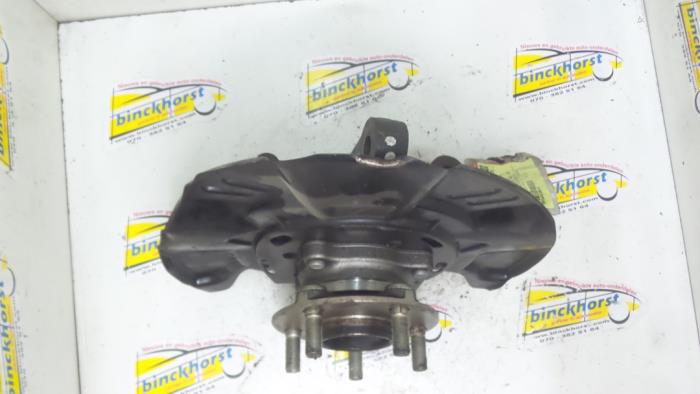 Knuckle, front left from a Subaru Legacy Wagon (BR) 2.0 D 16V 2009